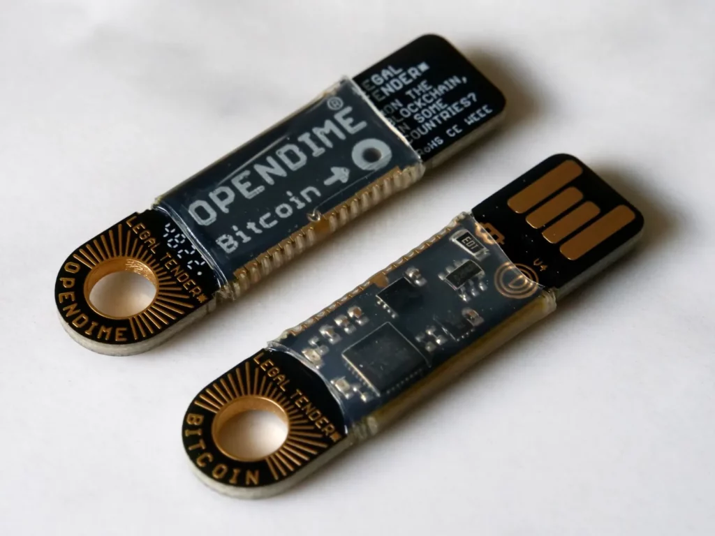 OPENDIME-Front-And-Back-Side-2-On-White-Marble