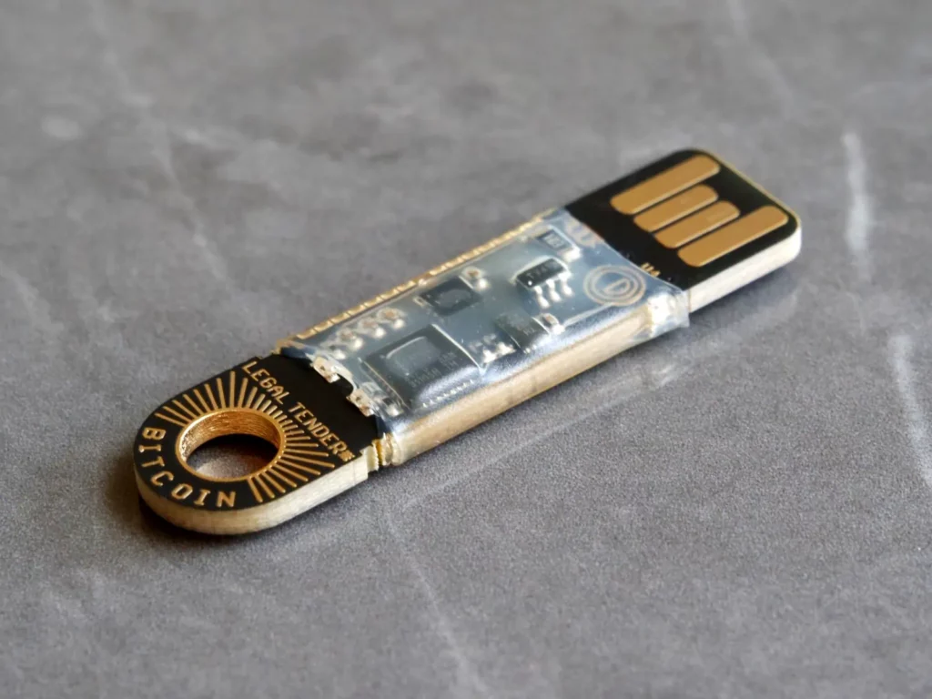 OPENDIME-Front-Side-On-Black-Marble